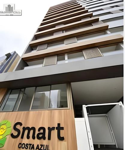 a building with a smart casa sign on it at New Studios by VLV Stays in Salvador