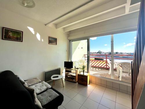 Photo de la galerie de l'établissement Bleu Courant - T4 avec balcon vue courant, à Mimizan-Plage