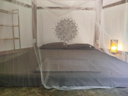 Postel nebo postele na pokoji v ubytování Little Nomads eco-guesthouse