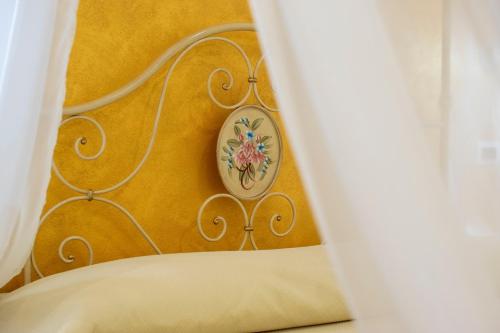 Katil atau katil-katil dalam bilik di Bed and Breakfast Camumidha