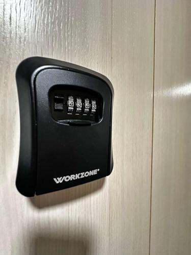 a black door knob on a wooden door at Konaci Kopaonik 28 in Kopaonik