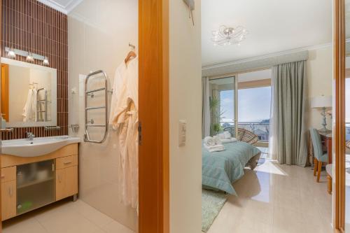 Postel nebo postele na pokoji v ubytování Burgau Penthouse