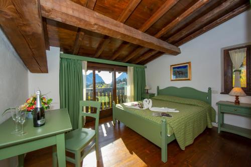 Ένα ή περισσότερα κρεβάτια σε δωμάτιο στο Liano Apartments