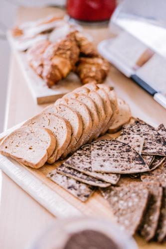 a group of bread and pastries on a table at Eldá Guesthouse in Myvatn