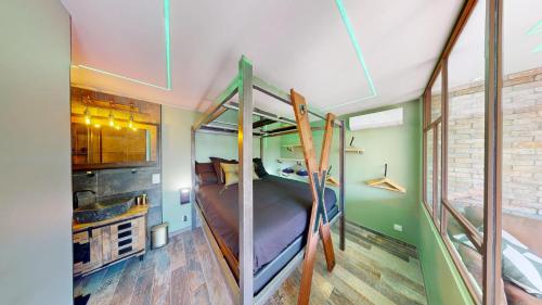 Postel nebo postele na pokoji v ubytování Villa Désir Village Naturiste Jardin et Jacuzzi