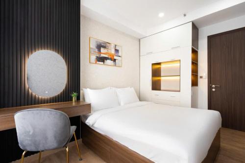Ένα ή περισσότερα κρεβάτια σε δωμάτιο στο StayX Condotel