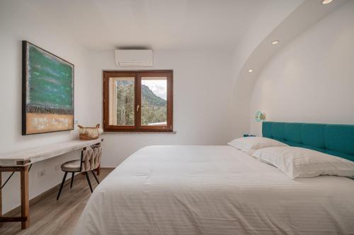 Ένα ή περισσότερα κρεβάτια σε δωμάτιο στο Villa Nuova di Design con Piscina Privata