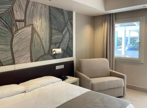 Ein Bett oder Betten in einem Zimmer der Unterkunft Hotel Mandetta - Adults Only