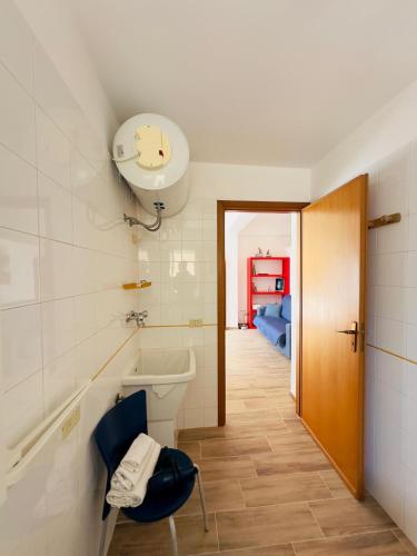 a bathroom with a sink and a toilet in a room at Balestrate Mare Centro Wi-Fi Self Check-in Aria Condizionata in Balestrate