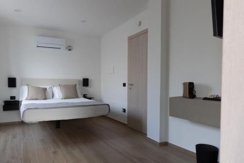 Katil atau katil-katil dalam bilik di Su Entu Guest House