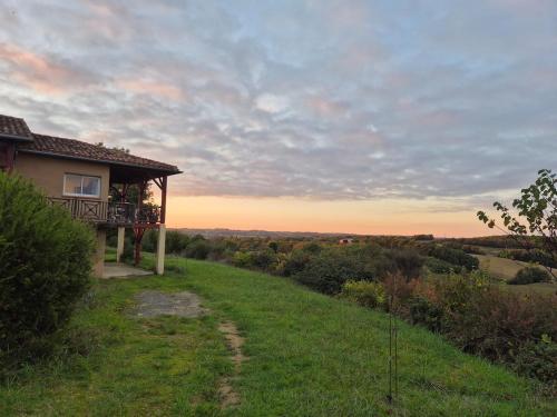 Beautiful house with pool table in a green setting