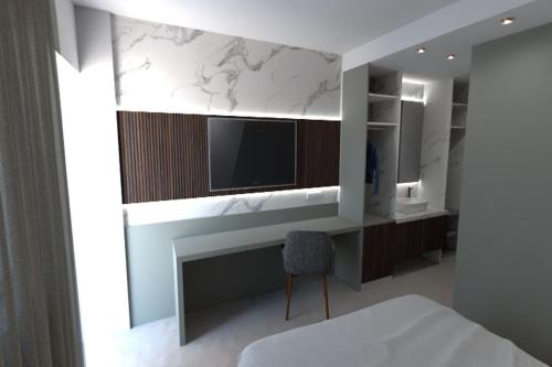 Postel nebo postele na pokoji v ubytování Poggio Hotel