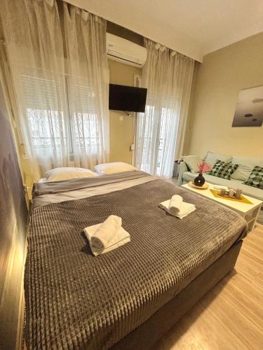Ένα ή περισσότερα κρεβάτια σε δωμάτιο στο Casa Centro Apartment