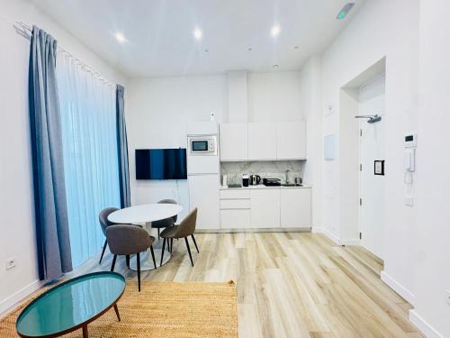 Η κουζίνα ή μικρή κουζίνα στο QE Apartments