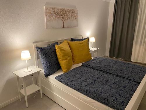 Ένα ή περισσότερα κρεβάτια σε δωμάτιο στο Apartment Ferienwohnung Leuna 2-room Apartement Second Home Gästezimmer