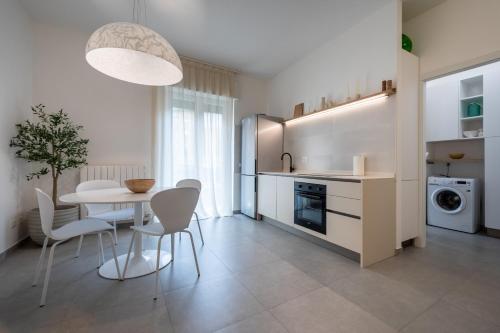 Cuisine ou kitchenette dans l'établissement Dimore Verona