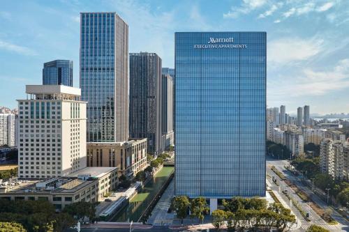a view of a large glass building in a city at AC Hotel Suzhou Industrial Park in Suzhou
