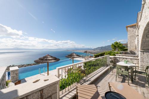 a view of the ocean from the balcony of a villa at Petra Thea in Kalamata