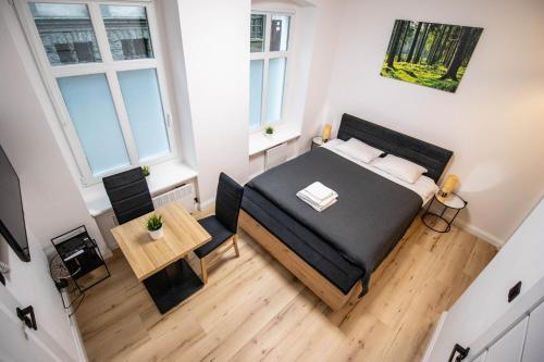 Posteľ alebo postele v izbe v ubytovaní Best Place Apartment