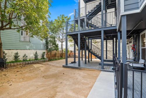 a patio with stairs leading up to a house at Kasa The Addison San Francisco in San Francisco
