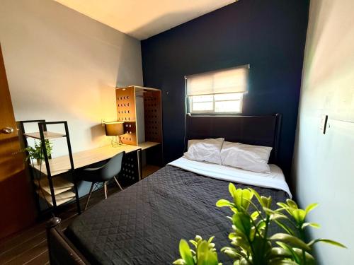 Katil atau katil-katil dalam bilik di RMS Hostal - SantaMaria