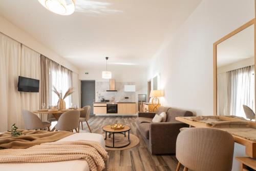 a living room with a couch and a table at Petra Thea in Kalamata
