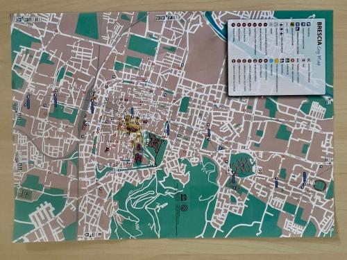 a map of a city on a wall at Ma Maison Hospital University School in Brescia