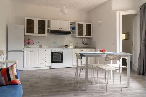 Kuchyň nebo kuchyňský kout v ubytování Depandance Luxe Cugnana
