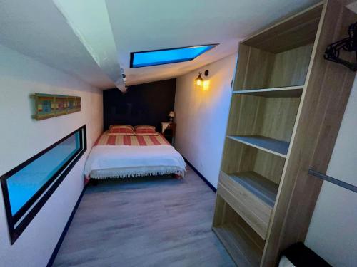 Ένα ή περισσότερα κρεβάτια σε δωμάτιο στο Bel Appt secteur Marais