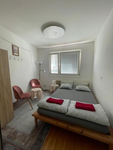 Postel nebo postele na pokoji v ubytování Rooftop Rooms Central
