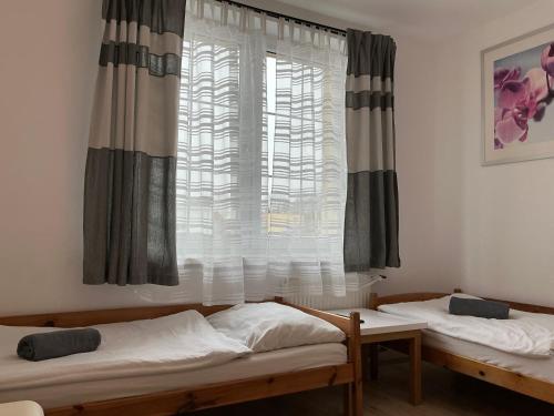 Katil atau katil-katil dalam bilik di Hostel Przed Świtem