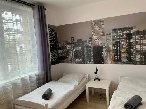 Katil atau katil-katil dalam bilik di Hostel Przed Świtem