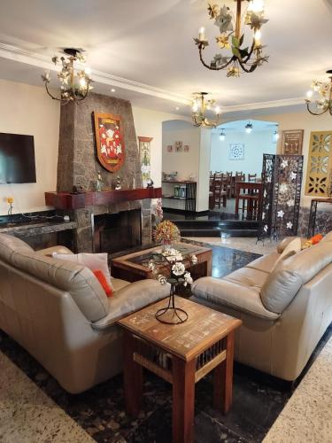 Χώρος καθιστικού στο Hotel Rio Penedo