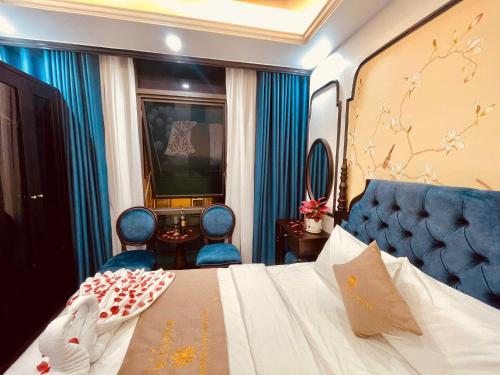 Postel nebo postele na pokoji v ubytování Majestik Hotel