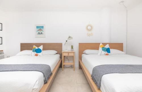 Ένα ή περισσότερα κρεβάτια σε δωμάτιο στο North Bay