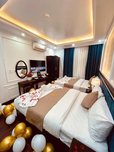 Postel nebo postele na pokoji v ubytování Majestik Hotel