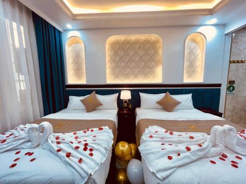 Postel nebo postele na pokoji v ubytování Majestik Hotel
