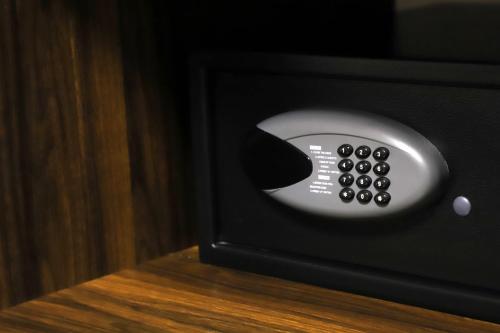 a close up of a remote control in a microwave at Tepeyac 402 in León
