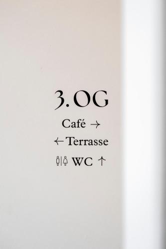 a whiteboard with a mathematical formula on it at Das Kaya Hotel Stuttgart Airport Messe in Filderstadt