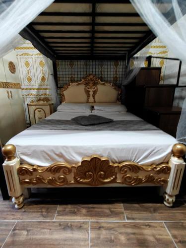 a bedroom with a bed with a white bedspread at Jessica Flat Malta Royal Guesthouse in Cospicua