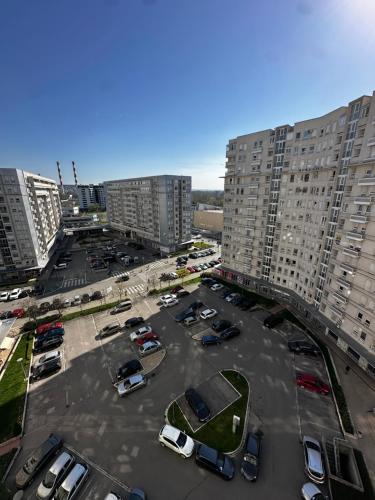 an aerial view of a parking lot with parked cars at Nevena Belville Apartments in Belgrade