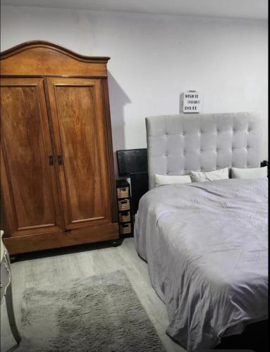 Ένα ή περισσότερα κρεβάτια σε δωμάτιο στο Appartement en attique Strasbourg ville proche gare Halles