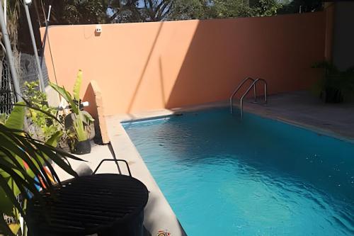 Kolam renang di atau dekat dengan C3 Alberca privada a 5 min de la playa y manglar!