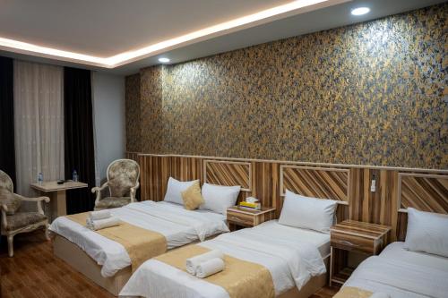 Kristal Hotel Duhokにあるベッド