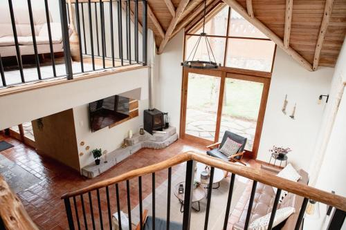 an overhead view of a living room with a laptop at Villas del Valle Sagrado in Cusco