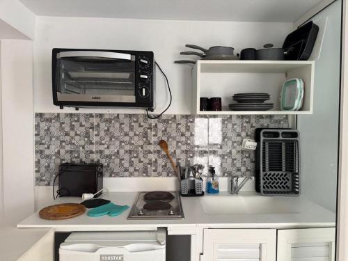 Una cocina o zona de cocina en Le cocon lumineux