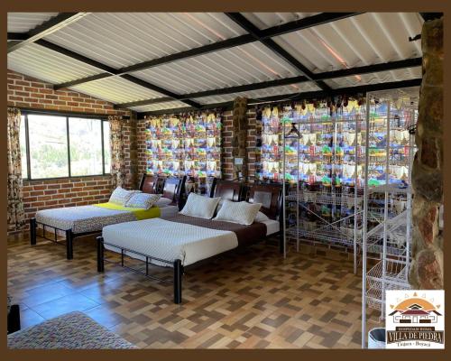 Fotografie z fotogalerie ubytování Hospedaje Villa de piedra v destinaci Tinjacá