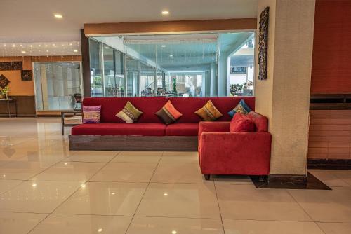 Χώρος καθιστικού στο Boss Suites Nana Hotel