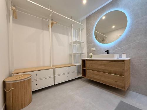 a bathroom with a sink and a mirror at Villa Tiffany in Puerto del Carmen