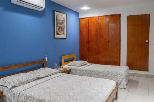 Postel nebo postele na pokoji v ubytování Hotel Veleros Cartagena